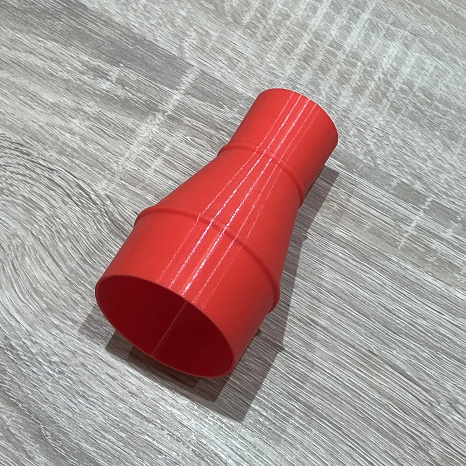 Dust collection adapter - Red adapter viewed at an angle, showing the wide opening
